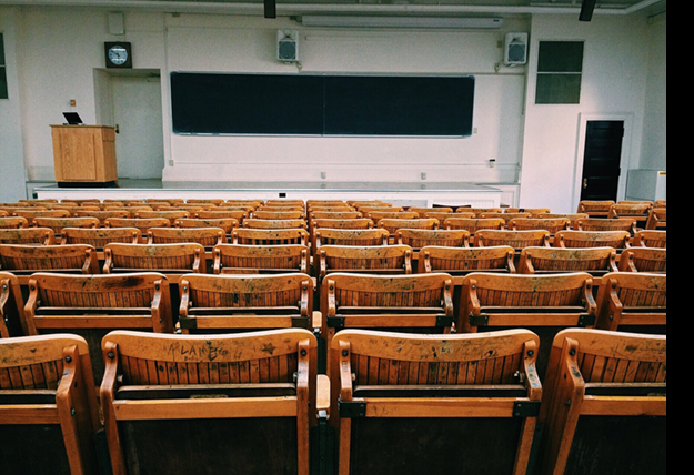 An empty auditorium, photo by Pexels